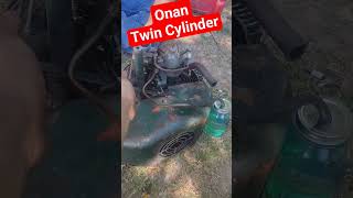 quick revving of an antique onan twin cylinder gas engine