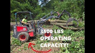 Moving BIG logs with the Intrepid KM250 articulating loader