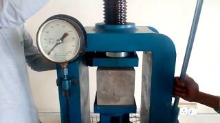 COMPRESSIVE STRENGTH TESTING WITH TESTING MACHINE