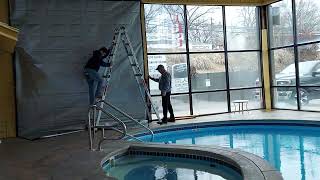 After Car Crash through Pool Hotel in Branson gets new window!