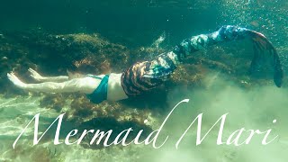 Mermaid friends swimming together in the beautiful ocean