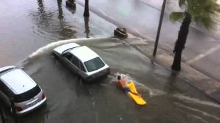 Guy tries to skitch car in flood!!! Is He Okay?