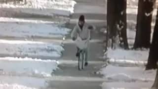 throwing a newspaper from a bike