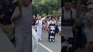 Para-athlete walks with Olympic torch thanks to exoskeleton | Humankind #shorts #olympics