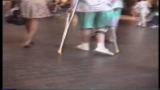 crutchman polio expo ( polio leg braces, crippled woman crutching, wheelchair)