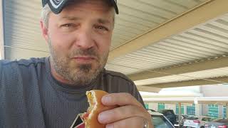 Crazy Greg OTR eating a hamburger full of spit