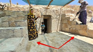 Another nomadic Lady's victory: completing the stonework of the stairs wall