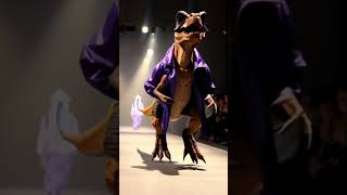 AI generated velociraptor on the catwalk #shorts