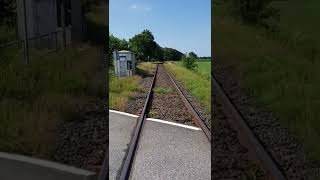 German train tracks through nature.zugschine durch Wald großenaspe Norddeutschland آلمان ریل قطار