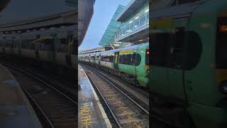 Class 377 with Graffiti departing Clapham Junction