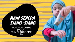 Anti gosong main sepeda tengah hari bolong