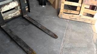 How to pick up a quarter with a forklift