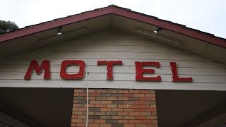 WE AT THE HOTEL MOTEL HOLIDAY INN (ABANDONED MOTEL)