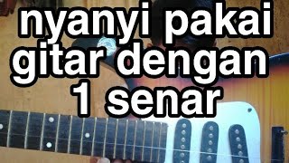 nyanyi pakai gitar dengan satu senar