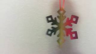 Rainbow snowflake that I made in school