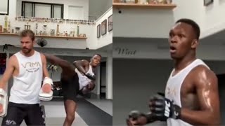 Israel Adesanya Almost Wheel-Kicks his Coach in the Head