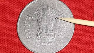 Retained struck through error coin of 1 rupee of 1995 of Calcutta mint