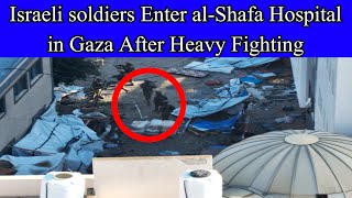 Israeli soldiers enter al-Shafa hospital in Gaza after heavy fighting