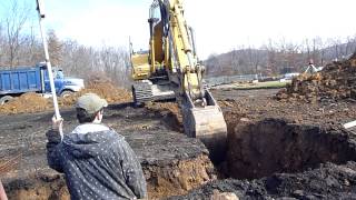 Komatsu Excavator Digging Footers