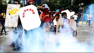 Violinist symbolic of Venezuela protest bloodied