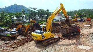 Excavator Trucks Digging Excavating Dirt For The Road Construction