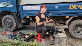 Girl repairs and maintains the oil tank of a car.