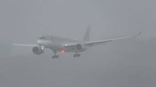 HEAVY RAIN at ZURICH AIRPORT / Qatar Airways A350-941 A7-ALL landing at Zurich Airport