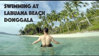 Swimming at Labuana Beach Donggala