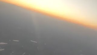 Awesome Sunset view of the city from the Plane.