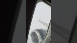 737-400 classic climbing through thick cloud ceiling