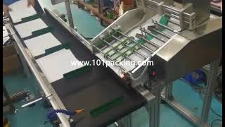 Paper label sheet paging counting feeding machine with feeding conveyor