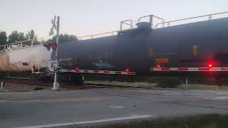 CSX 6156: with a short train in tow... On MOUNTAIN ROAD RxR crossing in Glen Allen, Virginia...