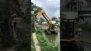 CAT Excavator construction working for roads