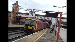 Royal Mail Class 325s passing Harrow & Wealdstone