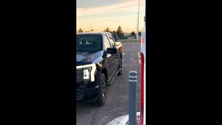 Charge Ford Lightning at Tesla Supercharger