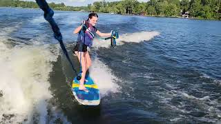 Laura surfing for the first time, before Phillip