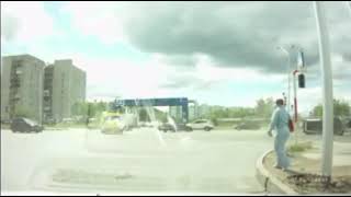 Russia: SUV flips over after being hit by ambulance at intersection