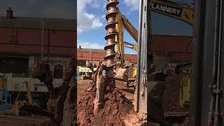 Star type auger cleaner working on RTG RG21T telescopic leader rig