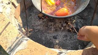 Putting a twig into cauldron