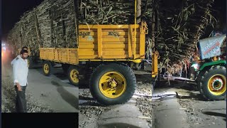 over loaded Sugarcane Trolley on  roadbreak 50 ton sugarcane loaded trolley L&T 5310