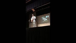 rich hall singing a song about me lifting up cheese with a forklift