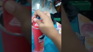 opening a packed pringles