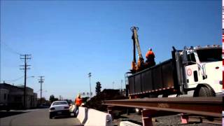 loading spikes and track debris from MOW work