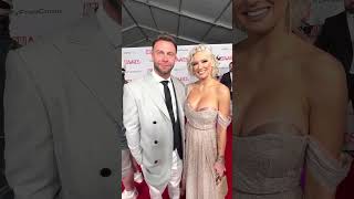 Porn stars Seth Gamble and Kenzie Taylor on the red carpet of the 2023 AVN Awards