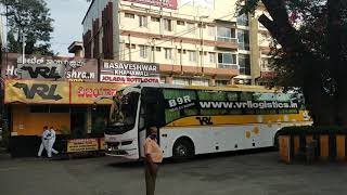 vrl Travels Volvo ac sleeper coming out from bus stop