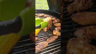 Grilling chicken wings, halloumi cheese and corn on Weber kettle grill