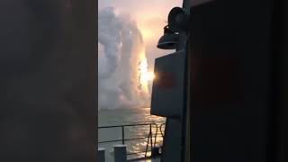 Russian warship launching a salvo of cruise missiles