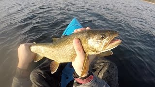 Jigging Lake Trout from a Half Frozen Lake