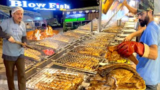 AMAZING IRAQI STYLE GRILLED FISH AROUND CHARCOAL AND WOOD FIRE | BIGGEST GRILLED FISH RESTAURANT