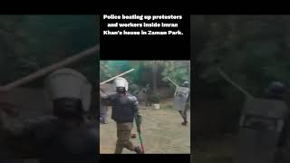 Police beating up protestors and workers inside Imran Khan's house in Zaman Park. #islamicvideo